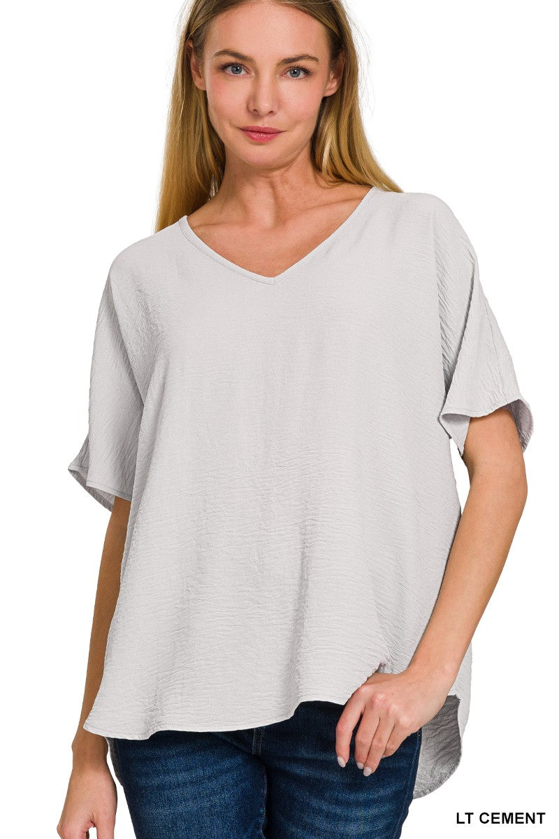 WOVEN AIRFLOW V-NECK SHORT SLEEVE TOP